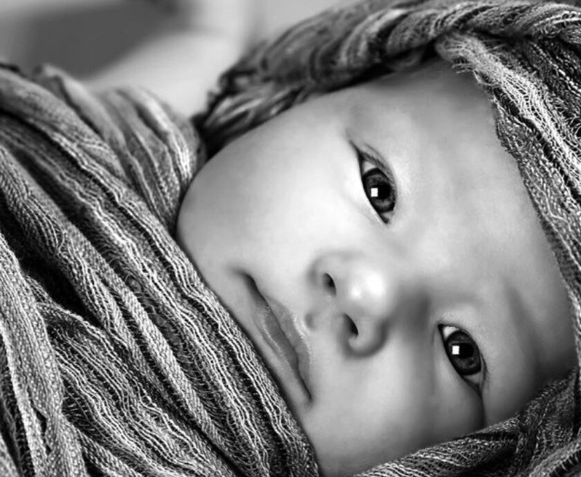 african-baby-wrapped-in-cloth-eyes-open-1500x-1024×997-1024×512